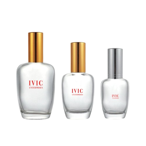 Three clear glass perfume bottles with gold and silver caps of ivic enterprises