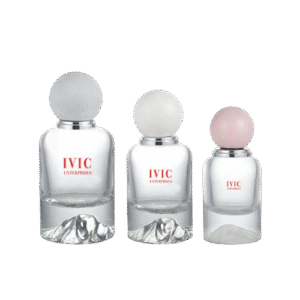 Three clear glass perfume bottles with round frosted caps, each in different sizes of ivic enterprises