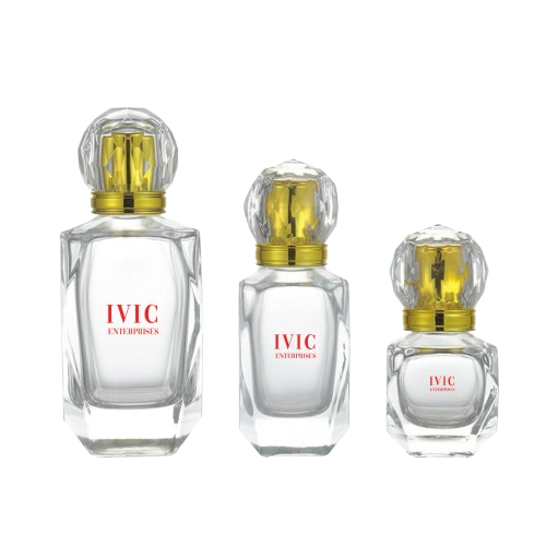 Three clear perfume bottles of varying sizes with gold and crystal-like round caps of ivic enterprises